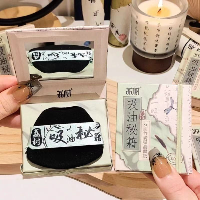 Oil-absorbing secrets: oil-absorbing sheets (with mirror and powder puff)