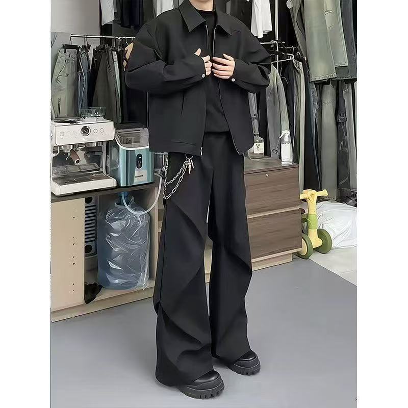Diamond-cut pleated trousers