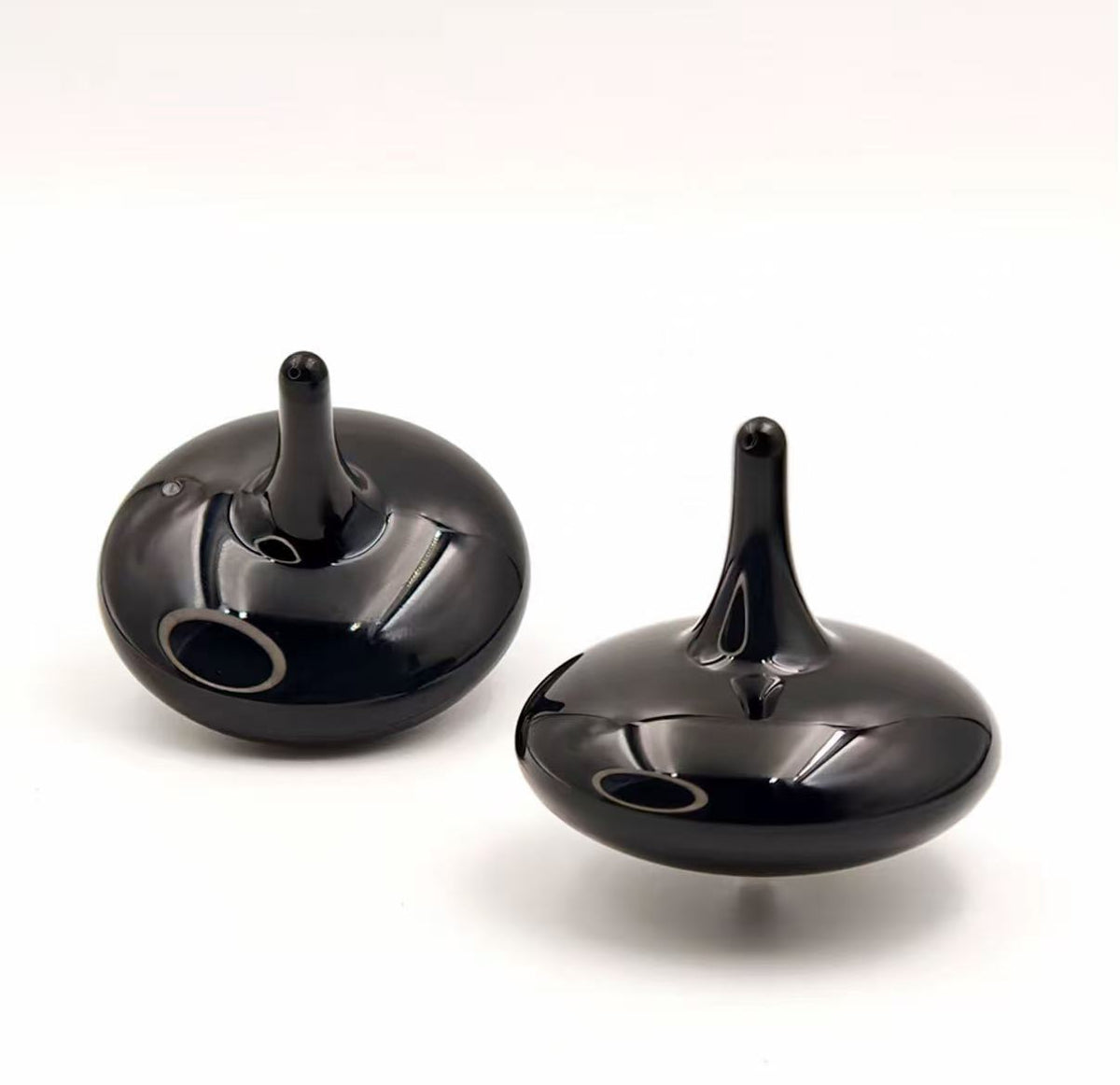 EKETOP spinning top! It spins for 4 hours, features a countdown timer, a real-life electric spinning top from Inception.
