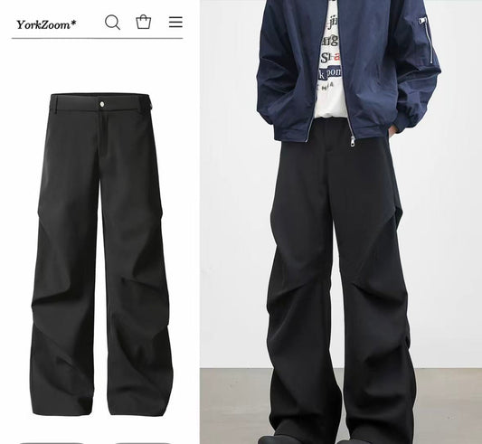 Diamond-cut pleated trousers
