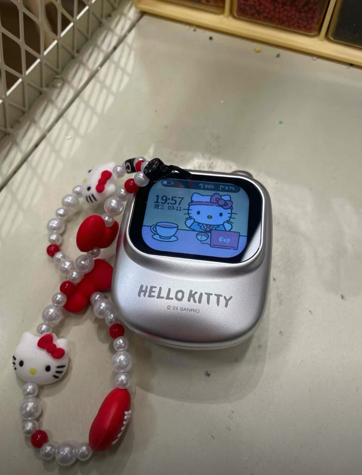 Hello Kitty Phone-Shaped Screen Bluetooth Earbuds
