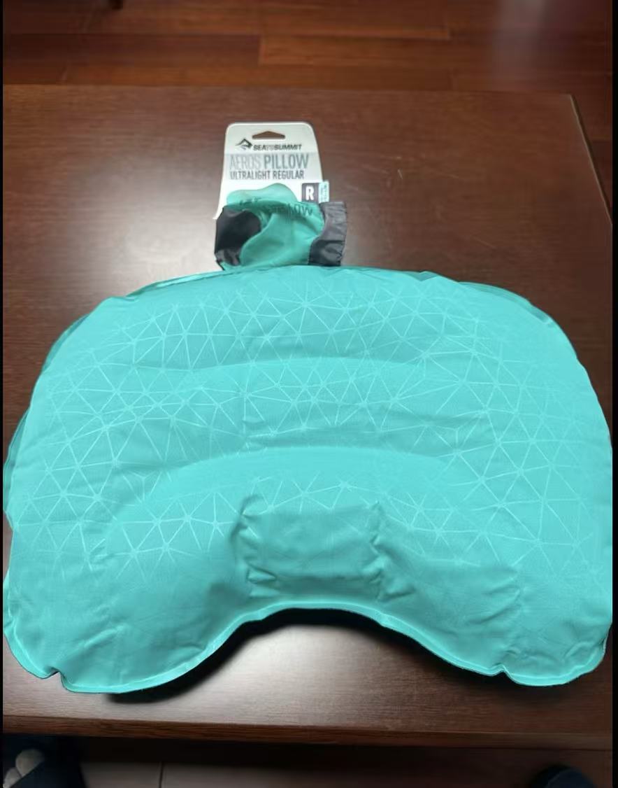 Portable inflatable pillow