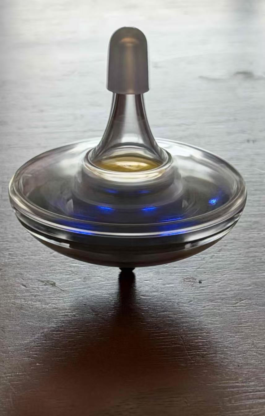 EKETOP spinning top! It spins for 4 hours, features a countdown timer, a real-life electric spinning top from Inception.