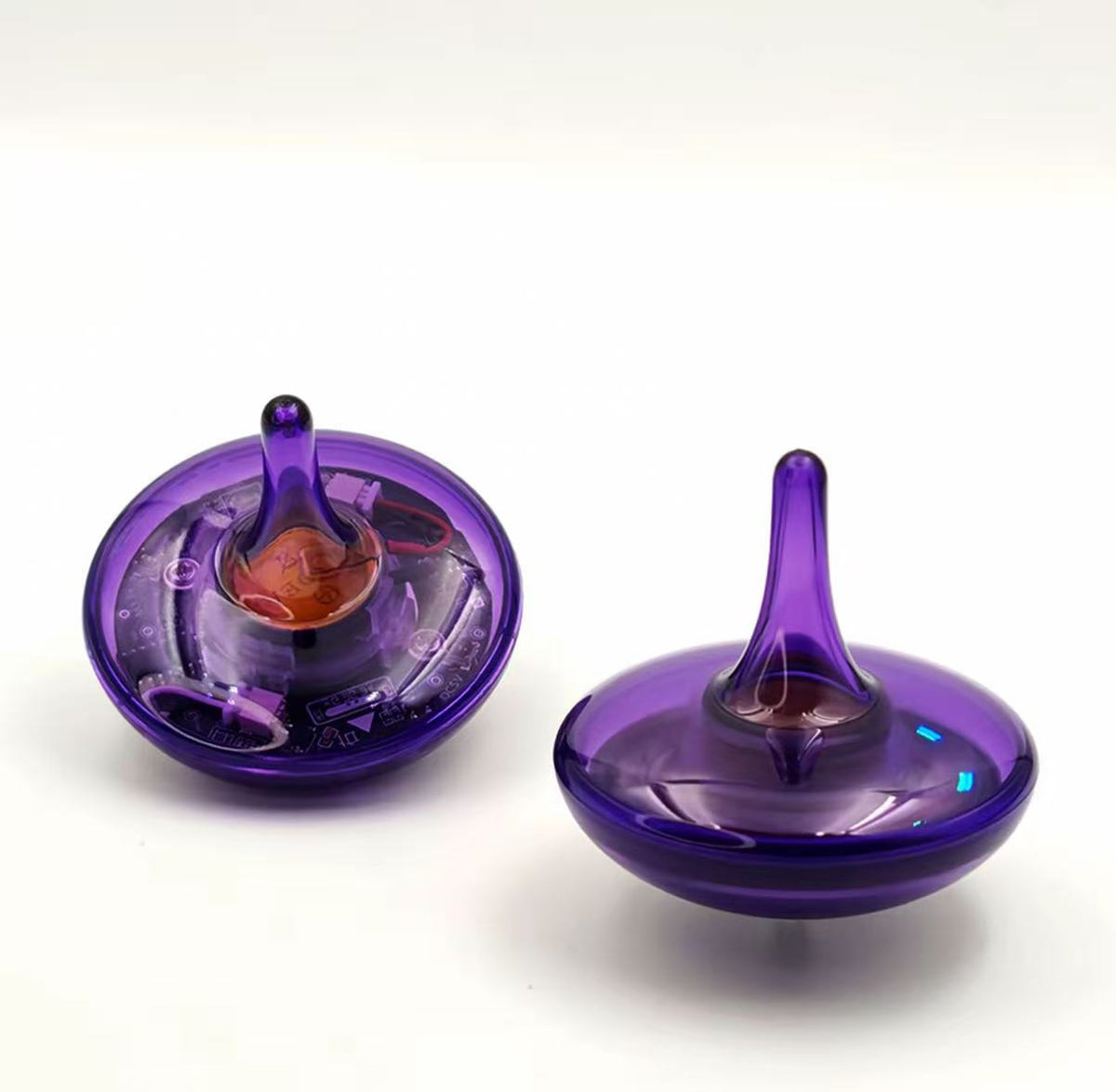 EKETOP spinning top! It spins for 4 hours, features a countdown timer, a real-life electric spinning top from Inception.