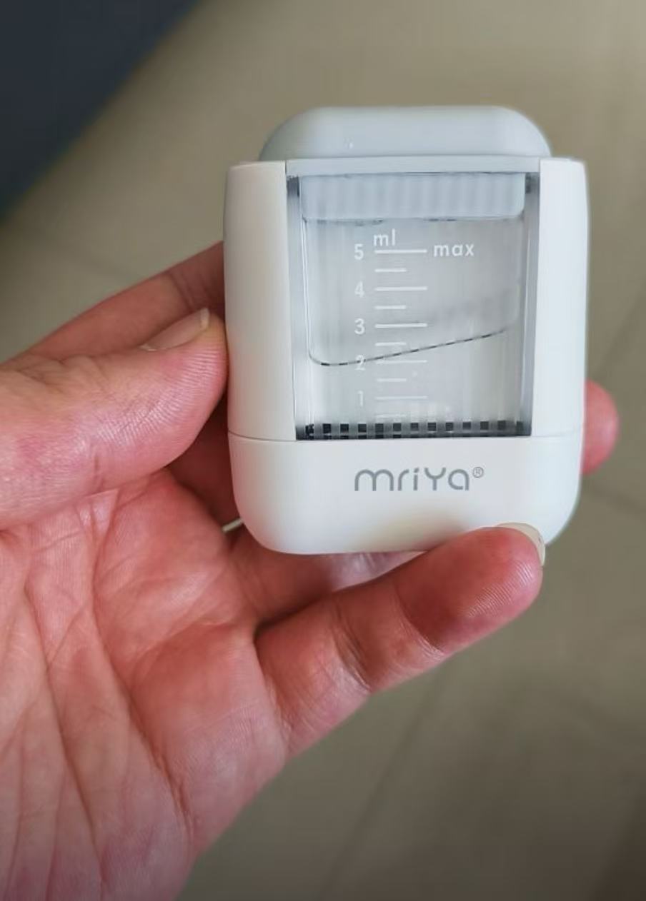 Mriya震動出液梳頭皮上液器