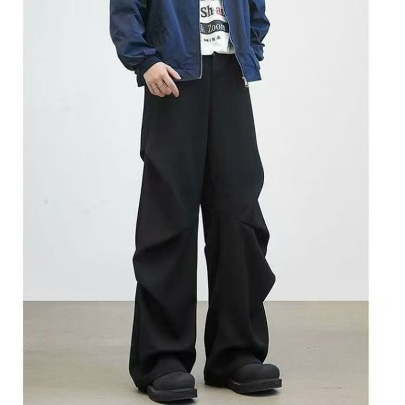 Diamond-cut pleated trousers